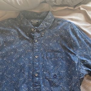 I am selling 7 BRAND NEW Abercrombie and Fitch long sleeve dress shirts.